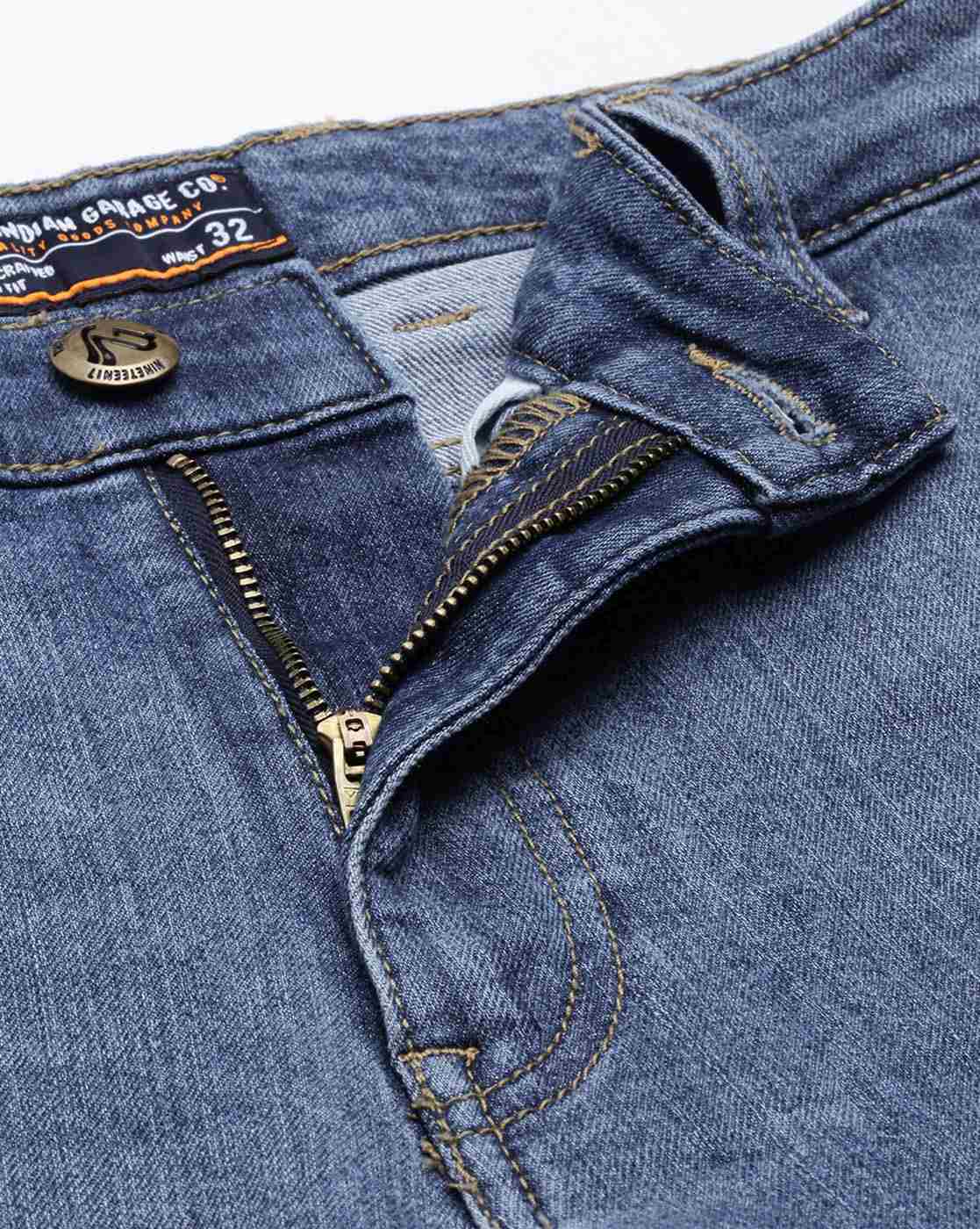 Lightly Distressed Slim Fit Jeans